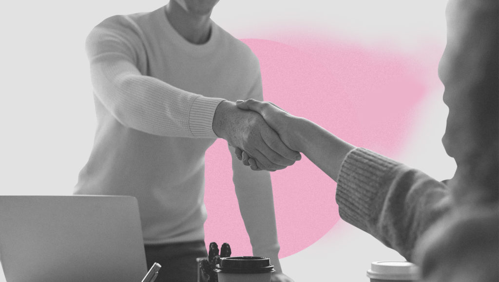 An applicant shakes hands with the interviewer during the interview process.